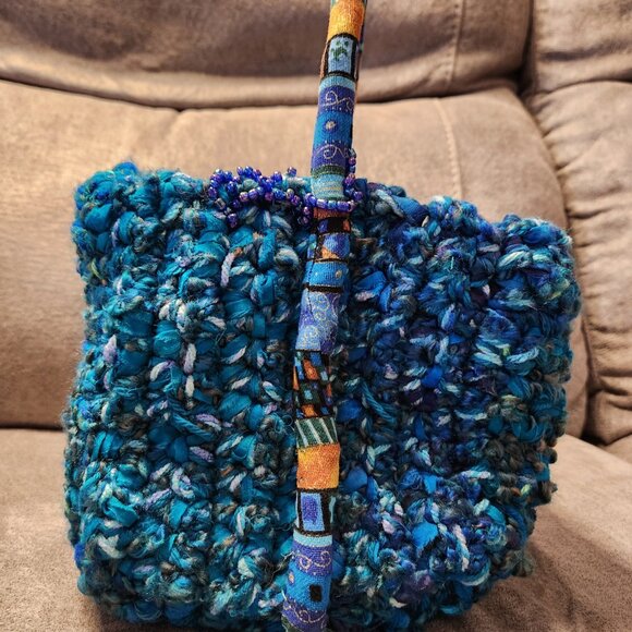 Basket, crocheted, new, 9x7in.with bendable, colorful handle. - Picture 2 of 2